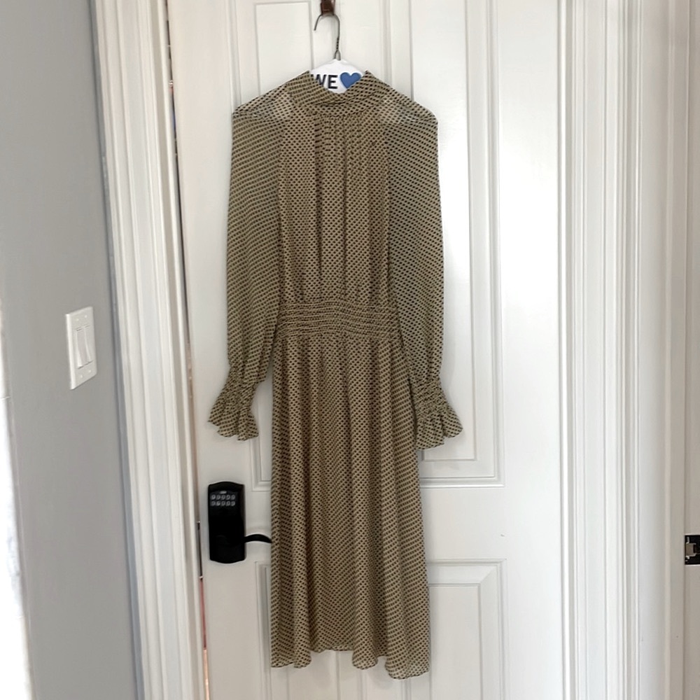 Tory Burch new with out tags never worn or altered waist and cuffs stretch